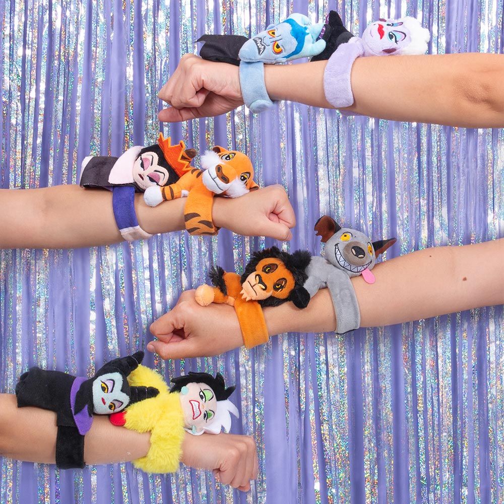 Cutie Cuffs plush slap bracelets worn on a row of wrists