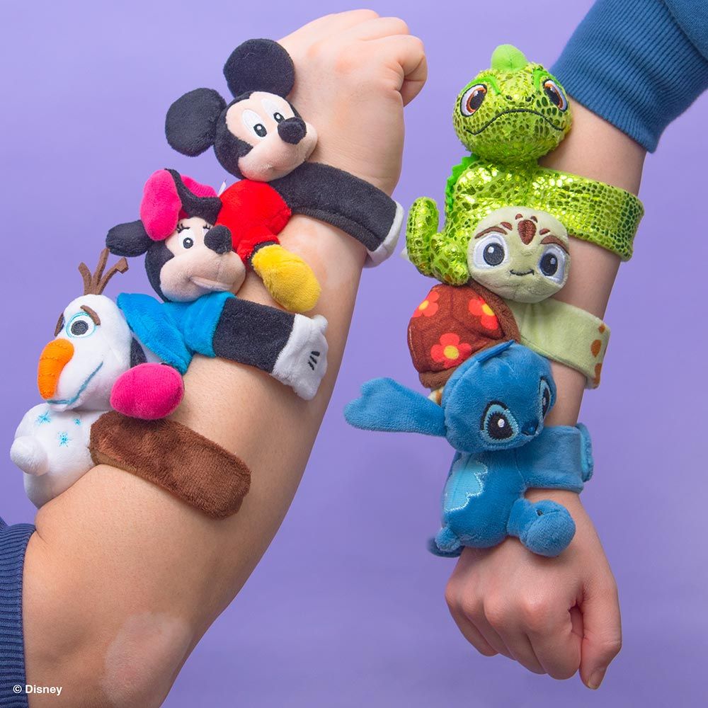 Disney Cutie Cuffs stacked on one arm
