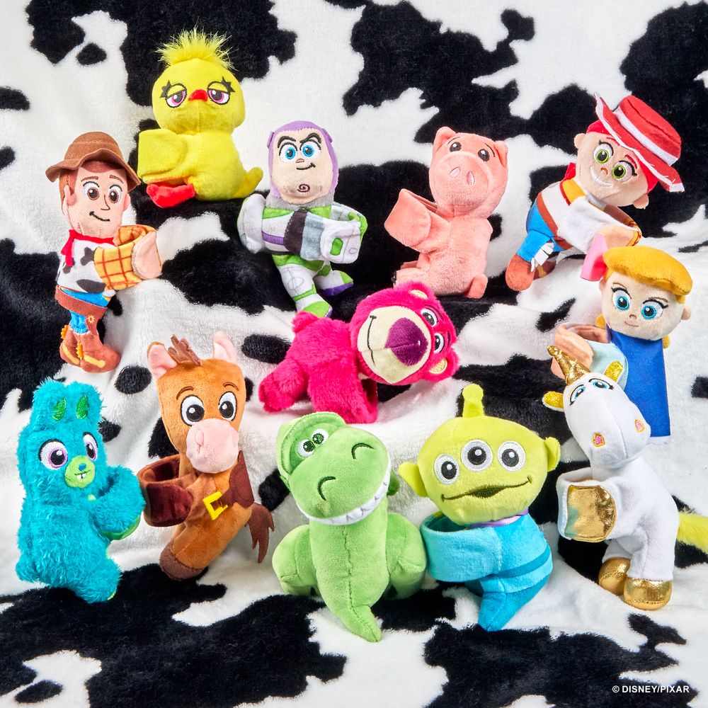 Toy Story Cutie Cuffs plush slap bracelets on cow print